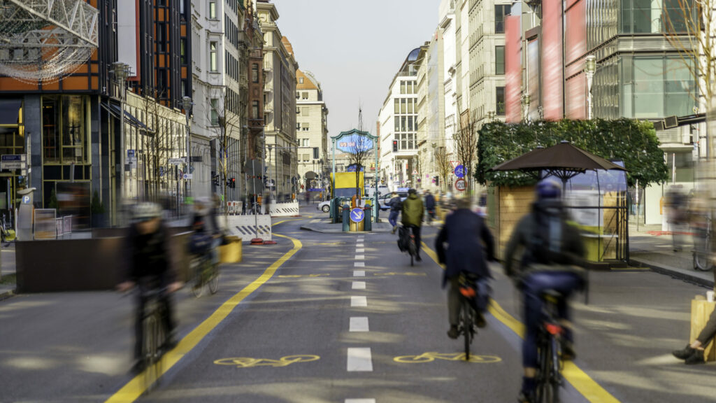 Pop-up bike in Berlin's city center. The bike path was put up during Covid-19 lockdown to help people commute to work without having to use public transportation. The bicycle path is also part of the initiative to make the city green and carbon free, by reducing emissions and improving the city's shopping street.